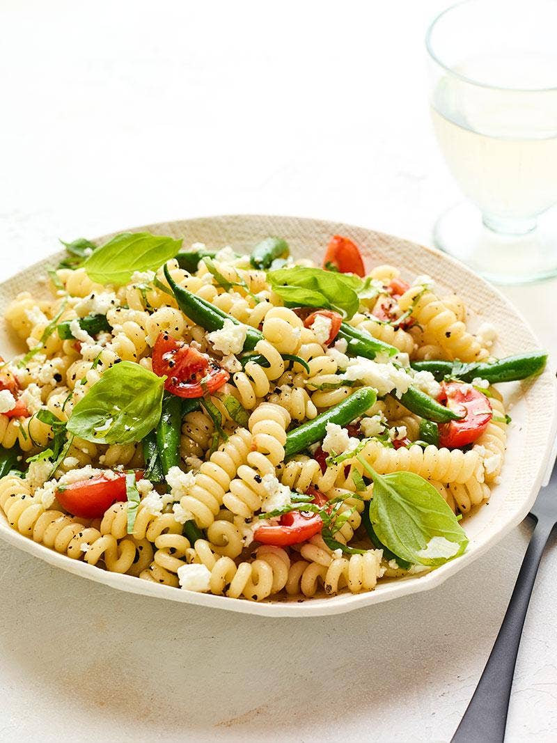 A bowl of veggie feta pasta.