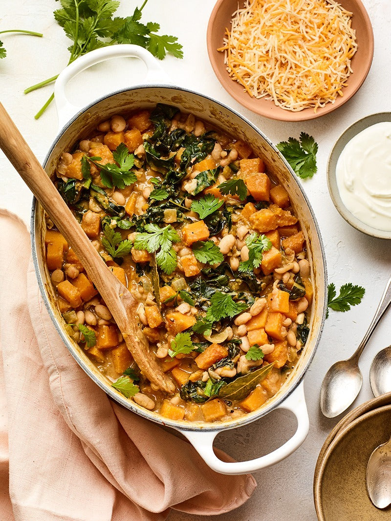 Winter white bean & butternut squash chili served in bowl.