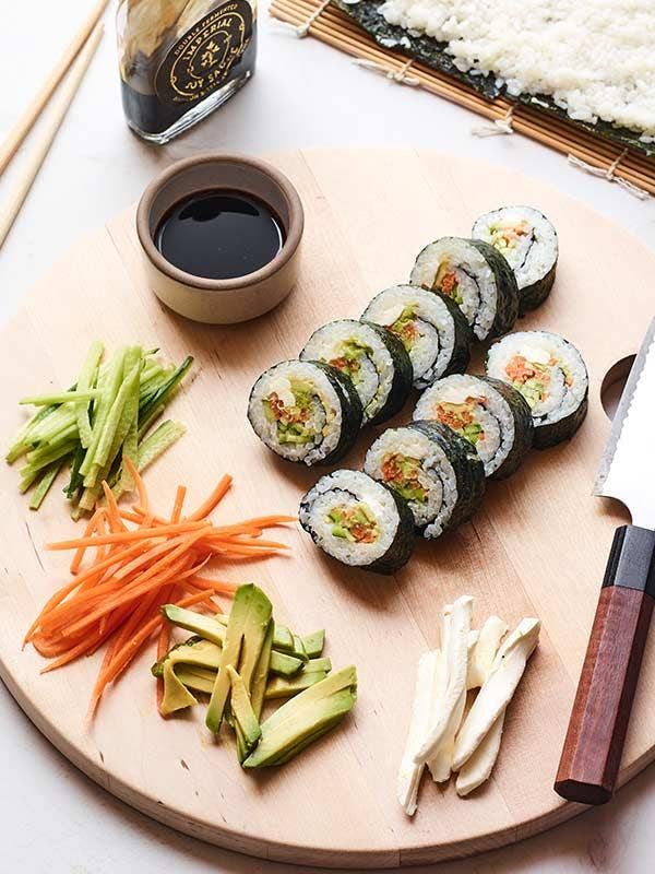 Vegetable sushi rolls with soy sauce.