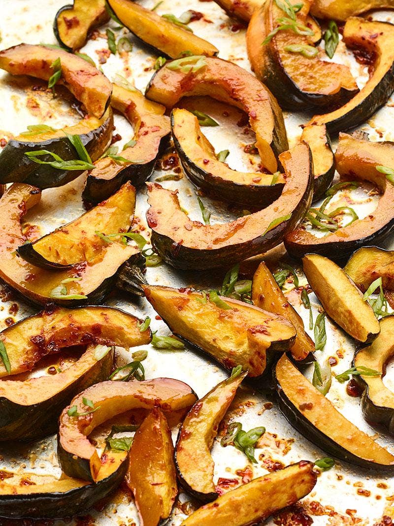 Spicy maple winter squash on a baking sheet.