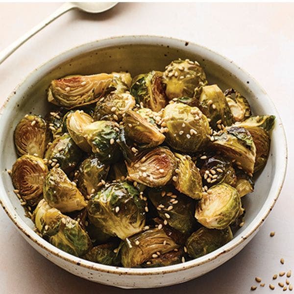 Sesame roasted brussel sprouts in bowl